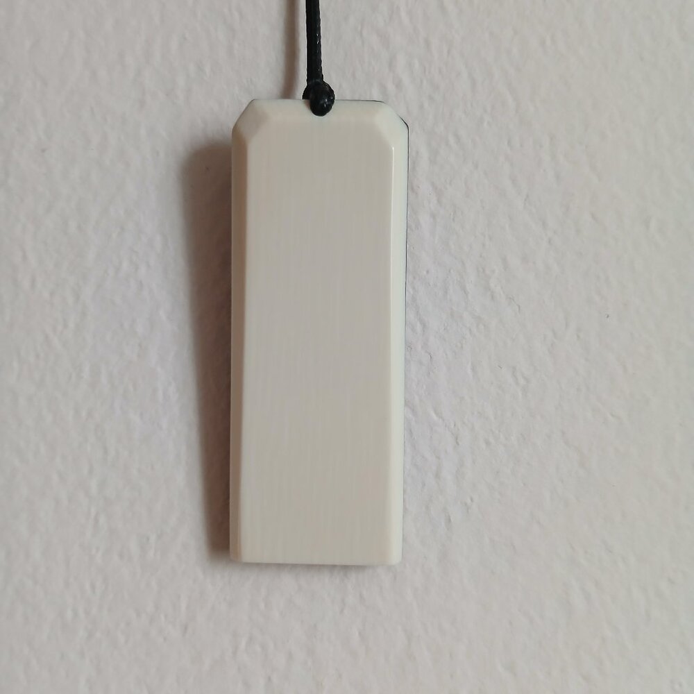 Mammoth tusk pendant in a hornbeam wood frame